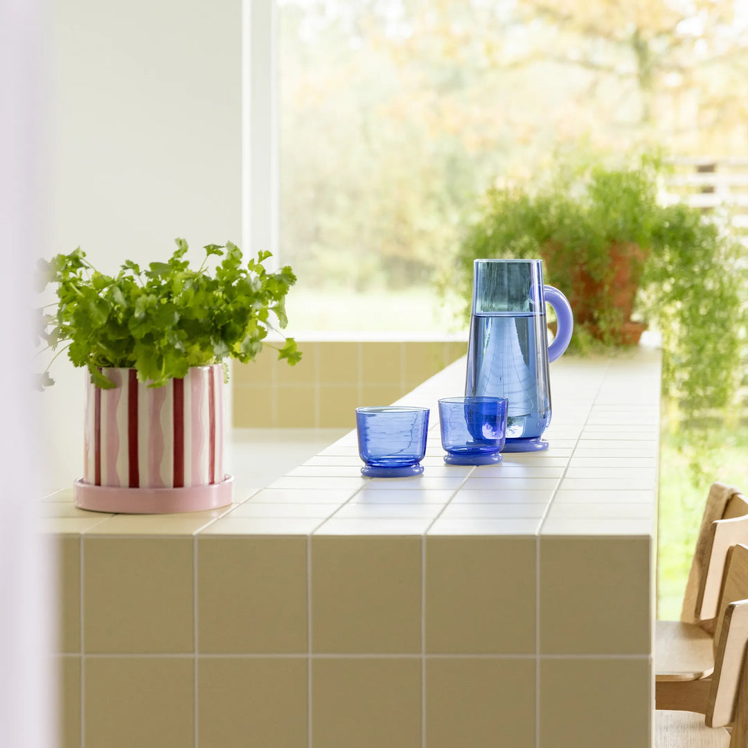 Klevering vatn glas blátt